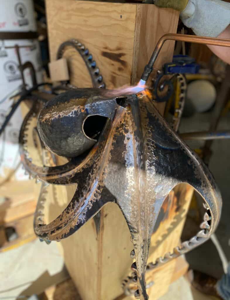 forging metal octopus