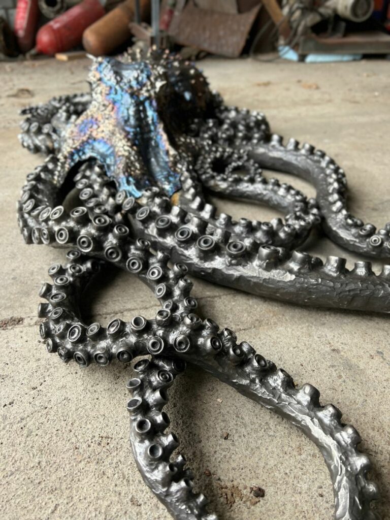 Oleg Turkovskiy completed iron metal octopus