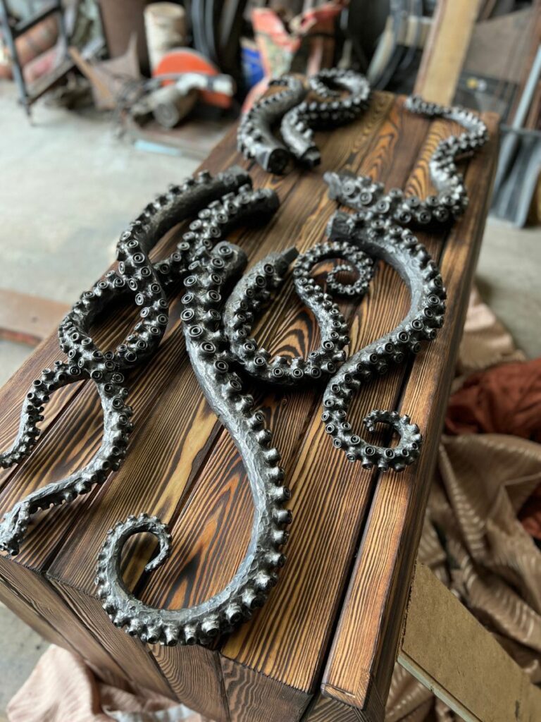 Oleg Turkovskiy completed iron metal octopus arms